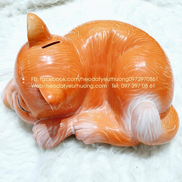 Mèo tiết kiệm dáng nằm màu cam 1.jpg